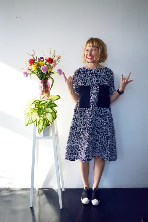 Fresh and New Spring Summer 2018 Black and White Cotton Dress with Contrast Pockets and Naked Shoulder Detail.