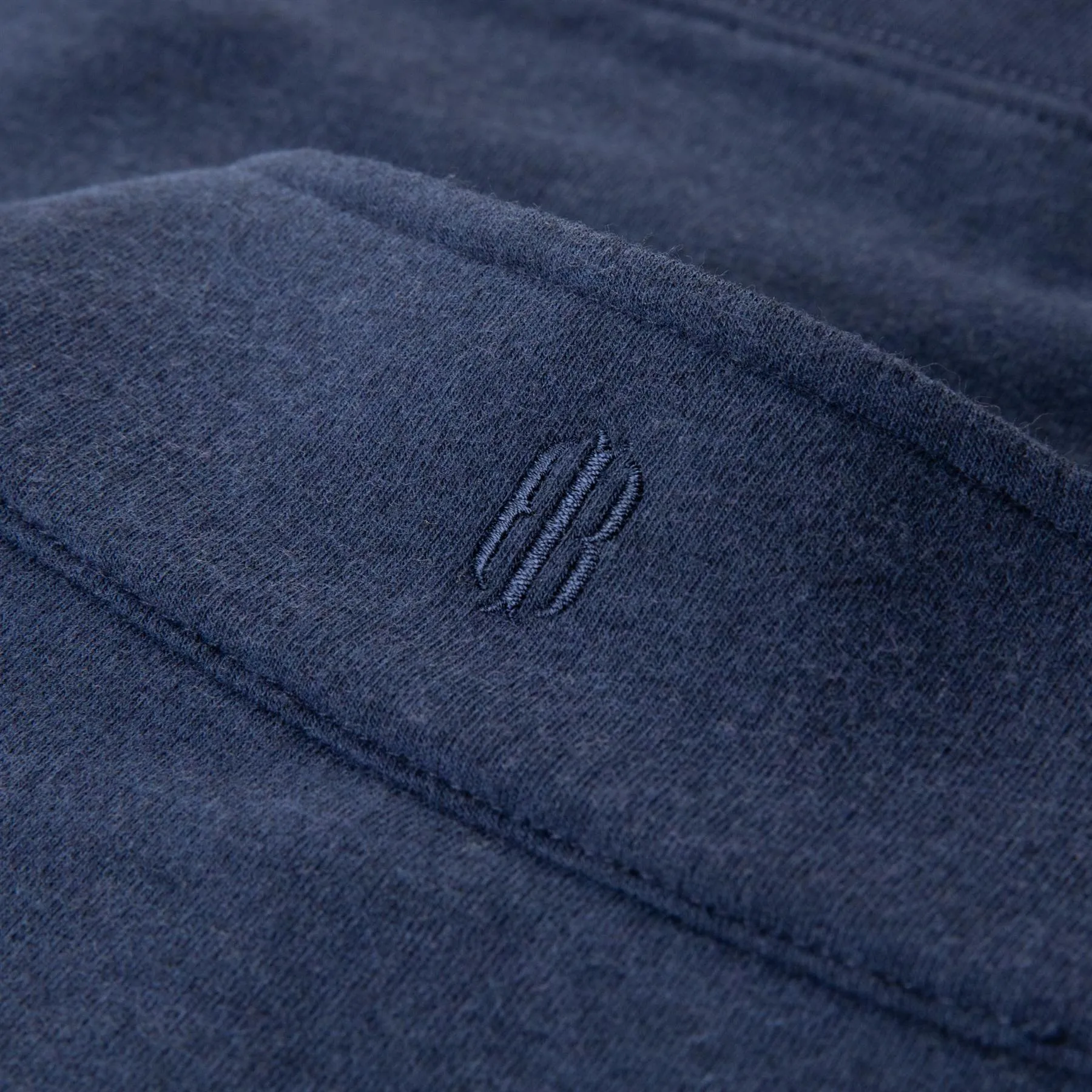 The Harper Quarter Zip Mid Layer Heathered Atlantic - SS24